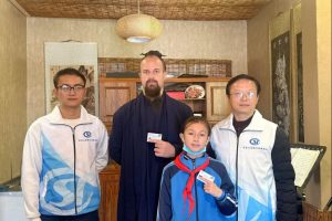 Американец получава първата социалноосигурителна карта в Wudang